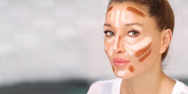 An image of a woman with different contouring make up samples on her face