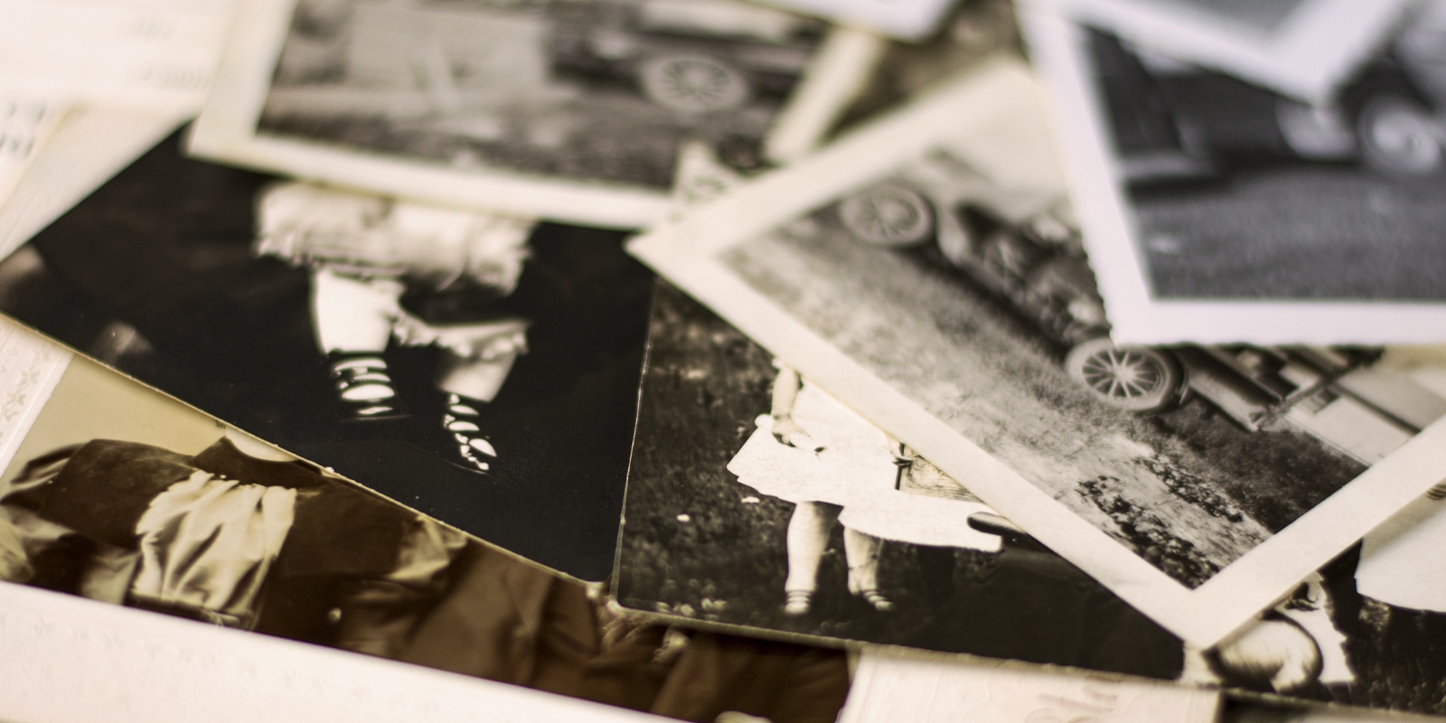 An image showing old photos on a table