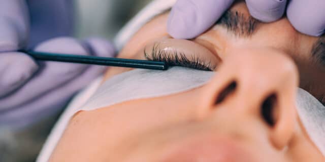 An image of a woman getting her eye lash lifted