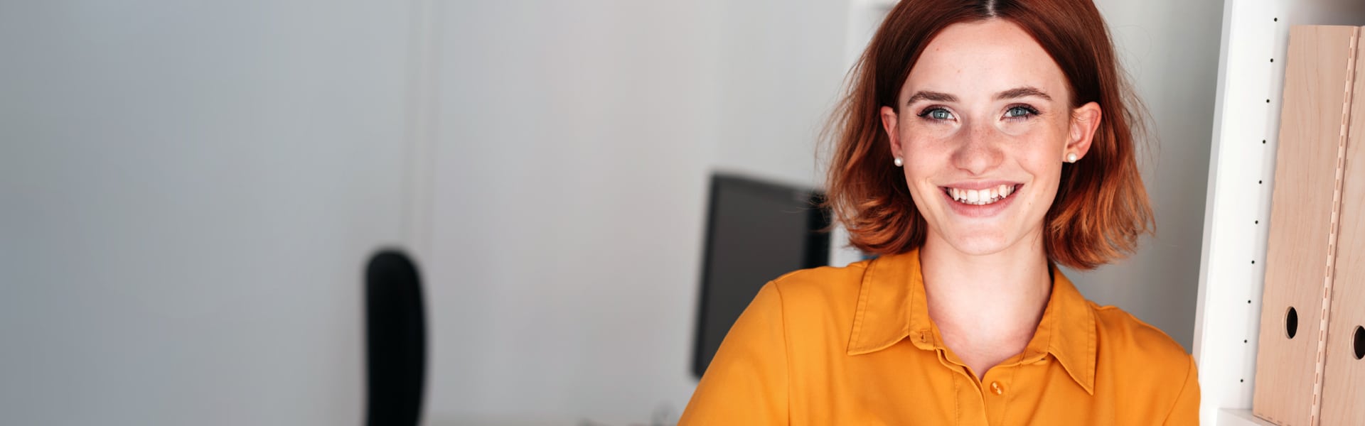 Smiling woman in office