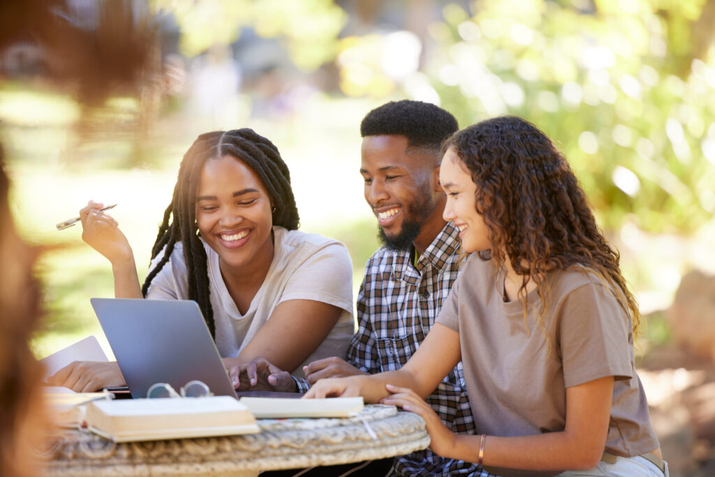 A group of students studying outdoors