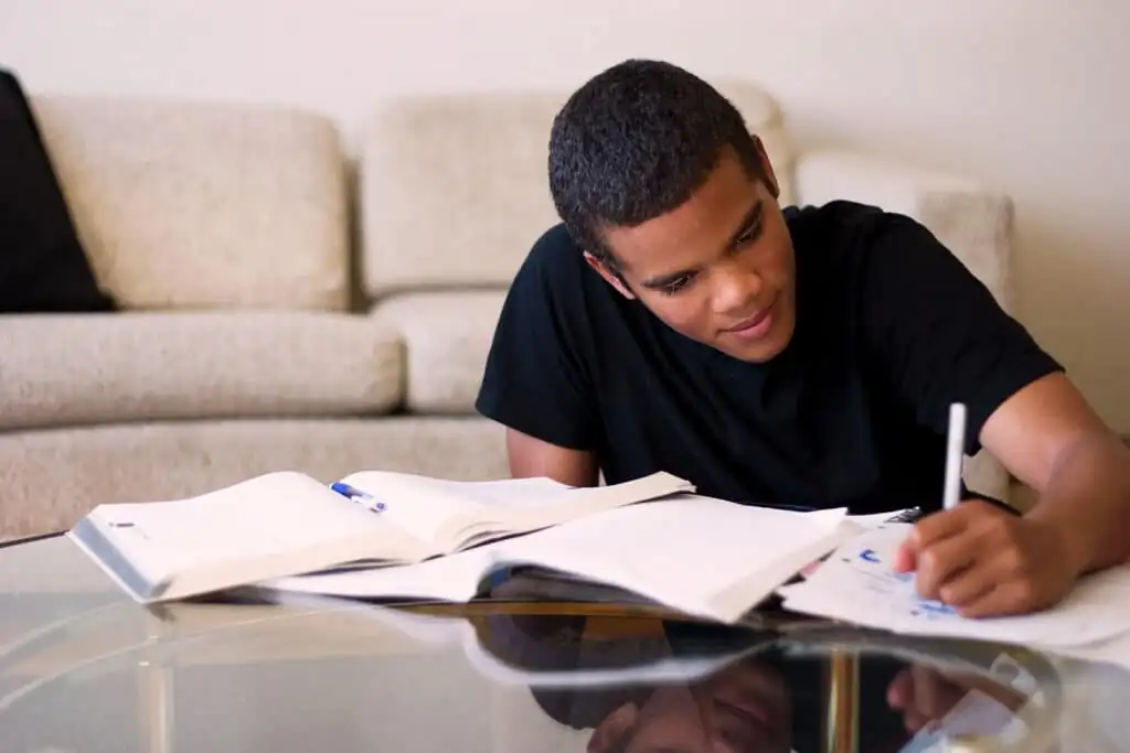 Student in the leaving room working on his UCAS
