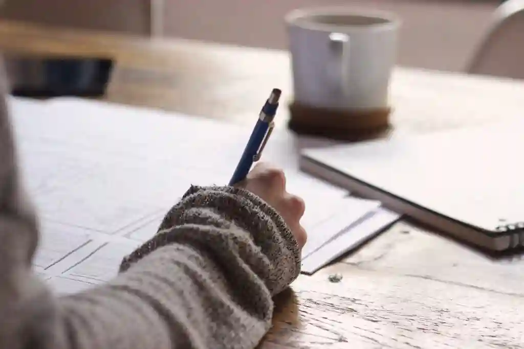 a woman draws out a plan